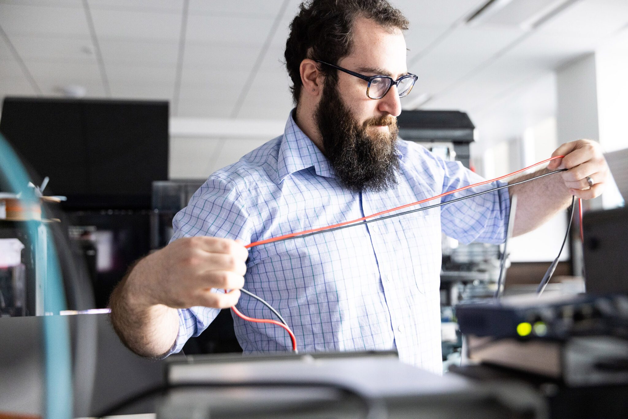 Software and AI engineers working at CMT Cambridge office